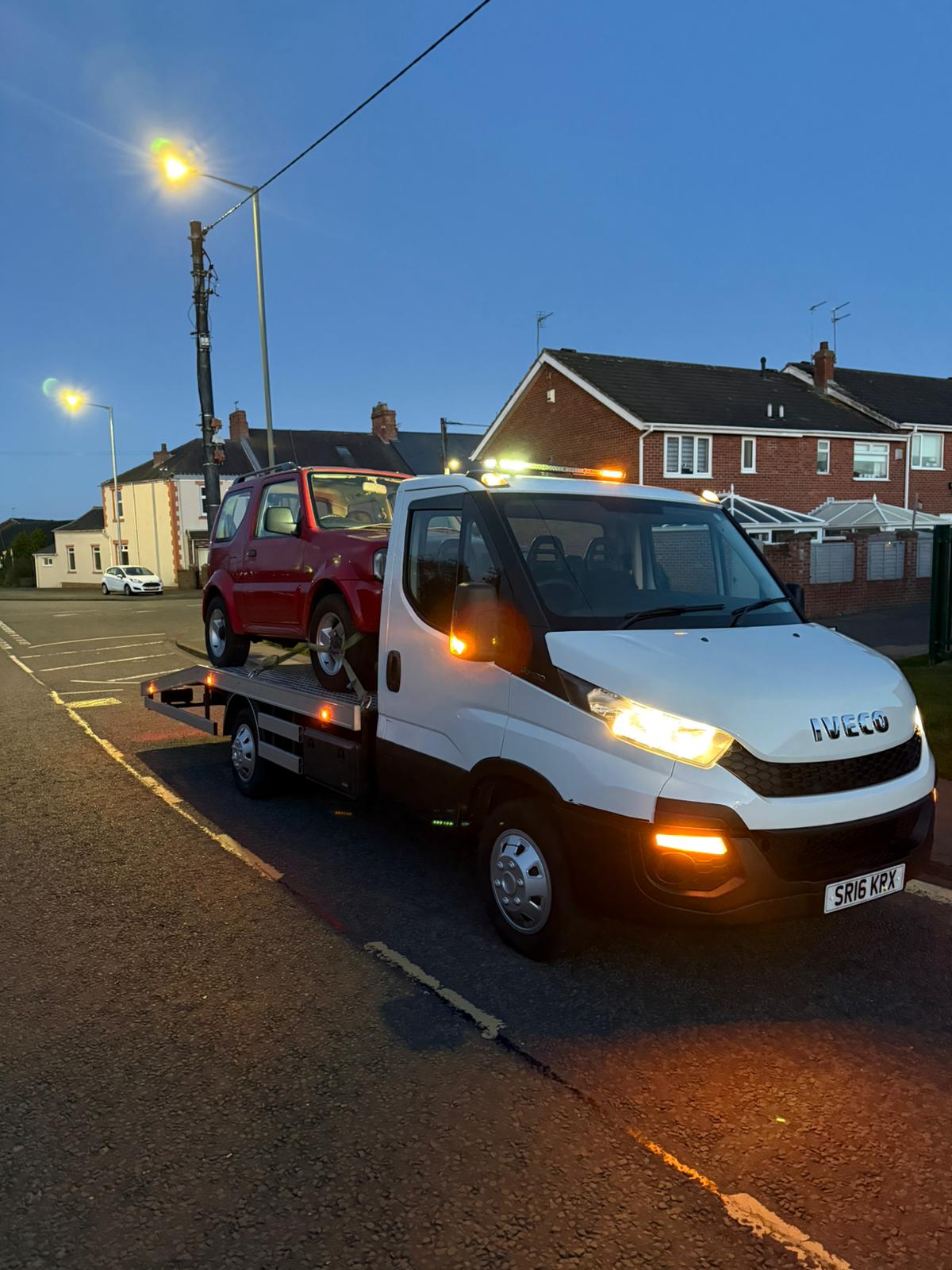 EV being recovered at night